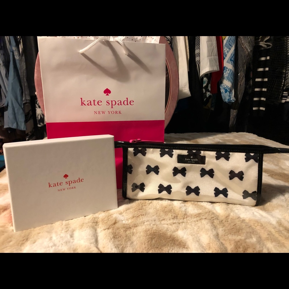 Kate spade plastic travel bag with bows